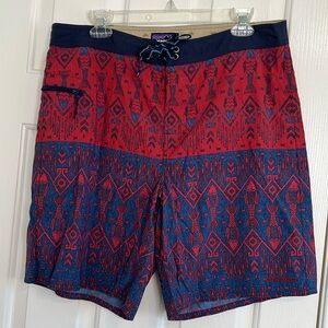Patagonia men’s Wavefarer® Board Shorts red and blue fish pattern size 36